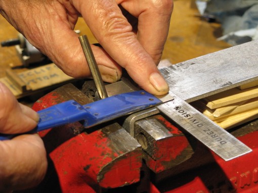 Filing the bevel with a diamond paddle