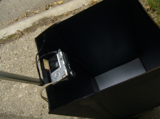 Camera mounted inside box